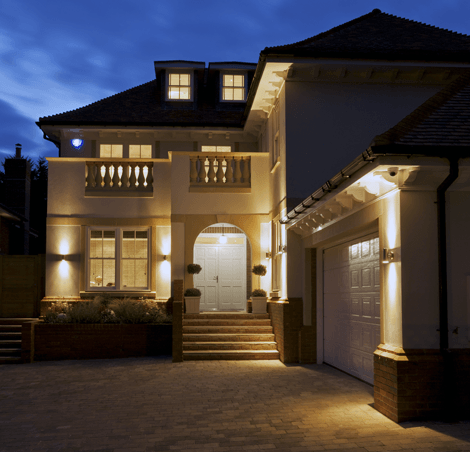 outside of house lit up at night