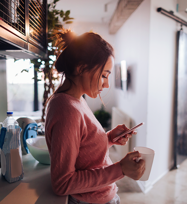 Woman on smart phone at home